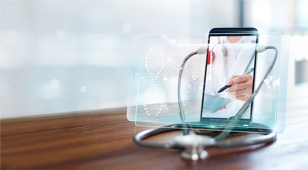 Ein Stethoskop und ein Tablet auf einem Schreibtisch, als Symbol für das Thema KI im Gesundheitswesen